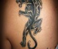 Tatuaje pantera de gatotattoo