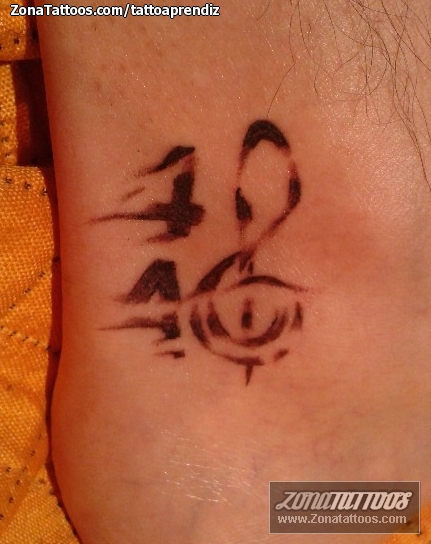 Tattoo of Musical notes, Numbers, Ankle